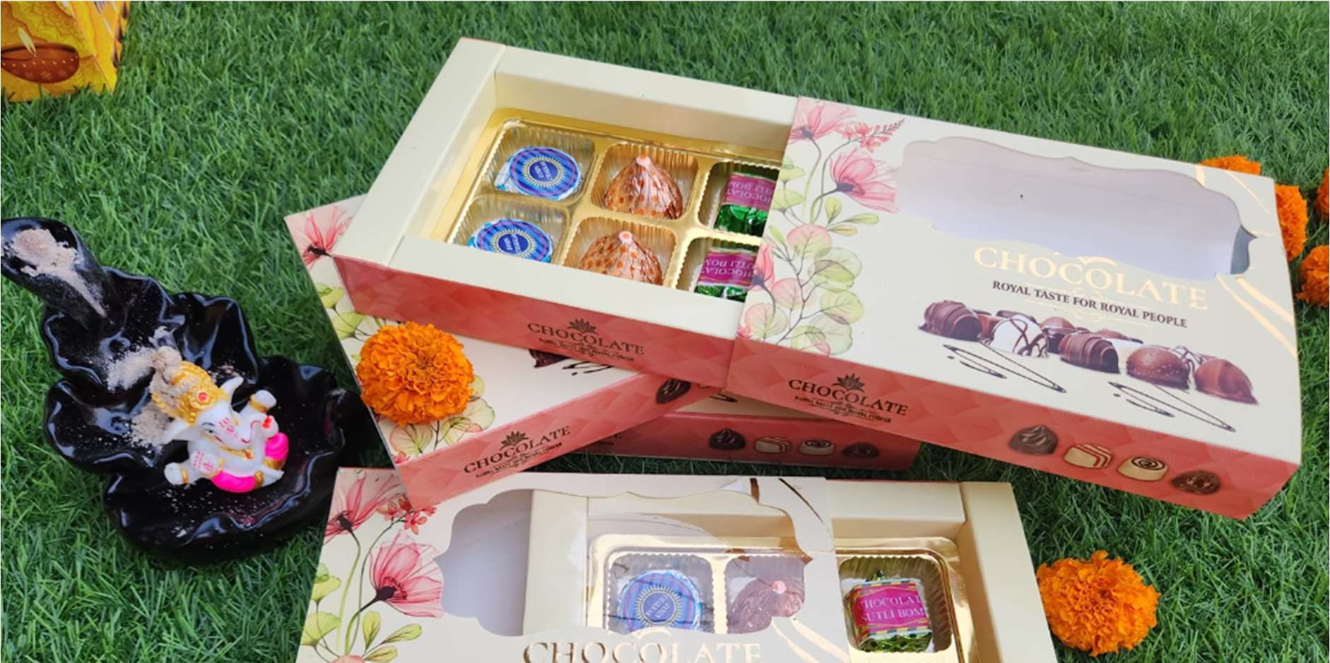 Royal taste chocolate gift boxes with truffles and Ganesha diya