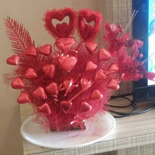 Red heart chocolate bouquet arrangement for birthday gift Raipur