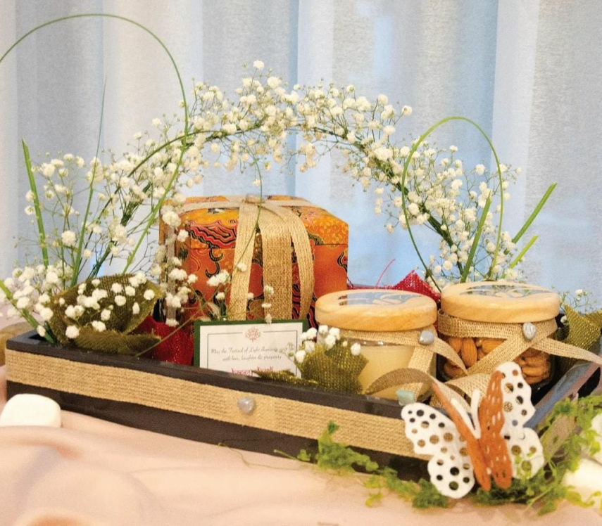 Rakhi special gift hamper with chocolates, cookies and rakhi for sister