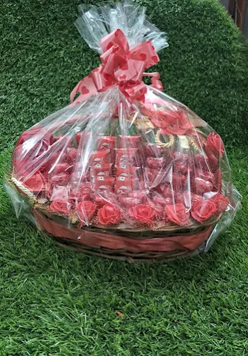 Red rose chocolate love hamper basket for girlfriend in Raipur