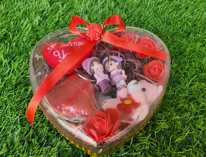 Heart keepsake gift box with couple keychains, roses and chocolates